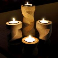 Four Piece Carved Sandstone Candle Holder Set