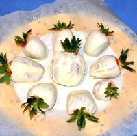 Place coated berries on grease proof paper.