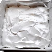 Pour marshmallow into the lined dish